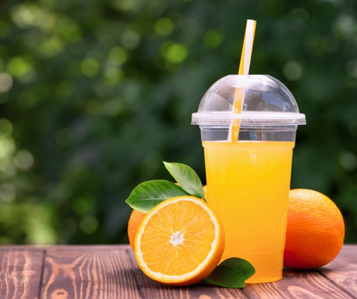 Fresh orange juice with whole oranges