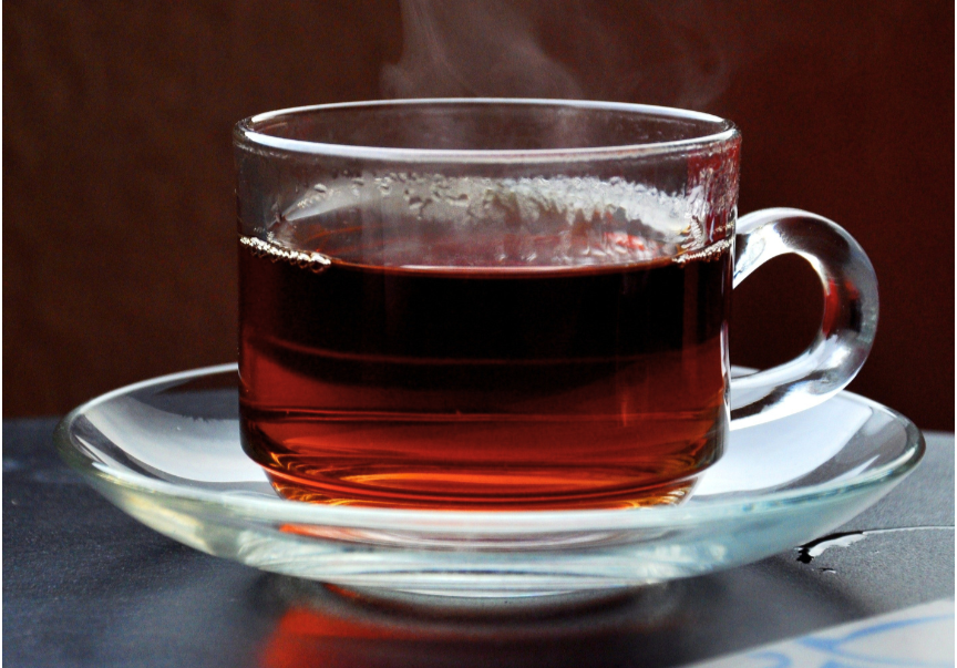 Black tea in glass cup steaming hot - black tea for weight loss