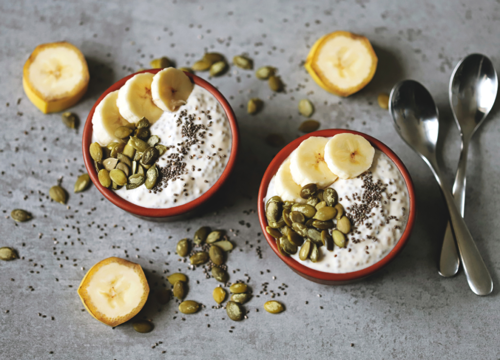 Yogurt bowl with banana, chia seeds and pumpkin seeds - healthy seeds to eat daily